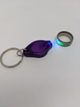 Load image into Gallery viewer, UV Flashlight Keychain - Switch on/off or Squeeze on/off
